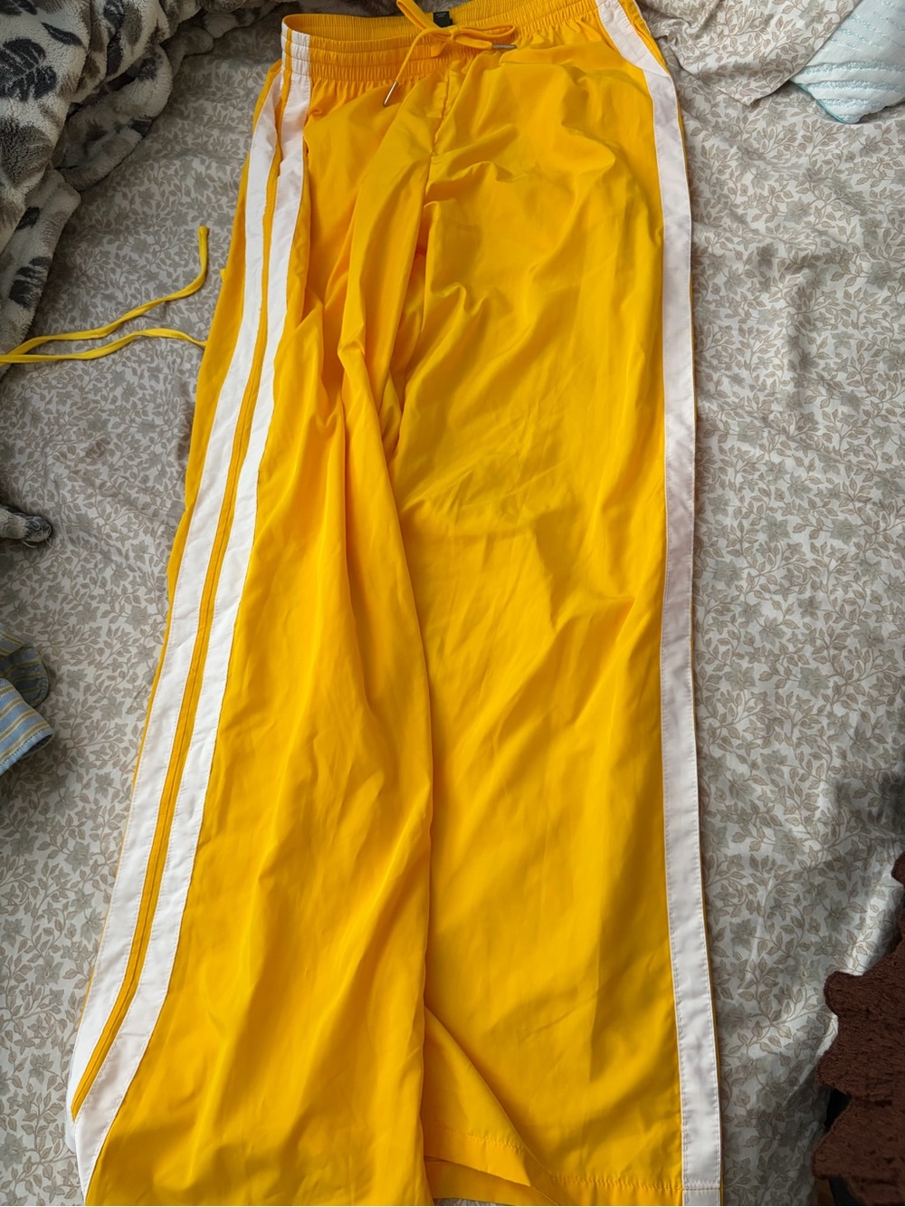 Yellow Track Pants with White Side Stripes